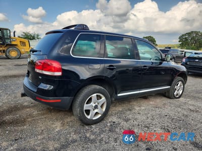Trzecie zdjęcie samochodu z tyłu: 2004 VOLKSWAGEN TOUAREG 3.2 VIN:WVGBC67L24D023910 - miniatura