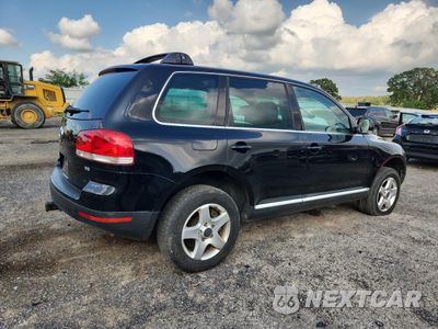 Trzecie zdjęcie samochodu z tyłu: 2004 VOLKSWAGEN TOUAREG 3.2 VIN:WVGBC67L24D023910 - miniatura