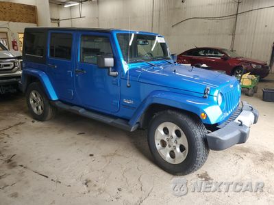 Czwarte zdjęcie samochodu z boku: 2015 JEEP WRANGLER UNLIMITED SAHARA VIN:1C4BJWEG4FL565177 - miniatura