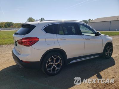 Trzecie zdjęcie samochodu z tyłu: 2019 BMW X1 XDRIVE28I VIN:WBXHT3C52K5L35465 - miniatura