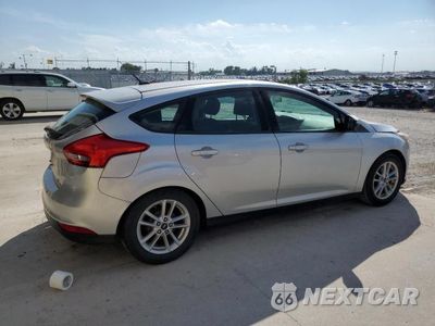 Trzecie zdjęcie samochodu z tyłu: 2016 FORD FOCUS SE VIN:1FADP3K22GL330993 - miniatura