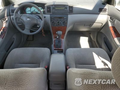 Zdjęcie 8 z 14 samochodu: 2003 TOYOTA COROLLA CE VIN:JTDBR32E930038906 - miniatura