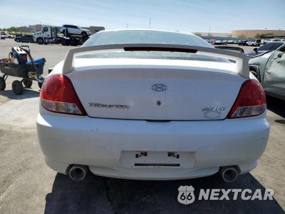 Zdjęcie 6 z 12 samochodu: 2005 HYUNDAI TIBURON VIN:KMHHN65F25U168299 - miniatura