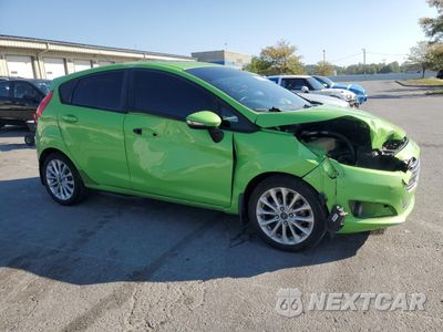 Czwarte zdjęcie samochodu z boku: 2014 FORD FIESTA SE VIN:3FADP4EJ5EM120716 - miniatura