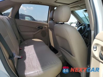 Zdjęcie 10 z 14 samochodu: 2003 FORD FOCUS ZTS VIN:1FAFP38353W265056 - miniatura