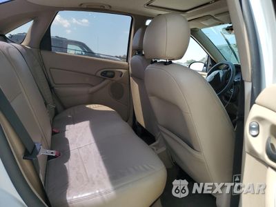Zdjęcie 10 z 14 samochodu: 2003 FORD FOCUS ZTS VIN:1FAFP38353W265056 - miniatura