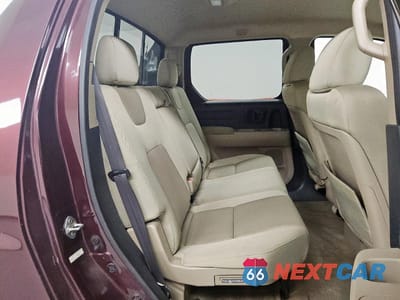 Zdjęcie 10 z 14 samochodu: 2011 HONDA RIDGELINE RTS VIN:5FPYK1F47BB006354 - miniatura