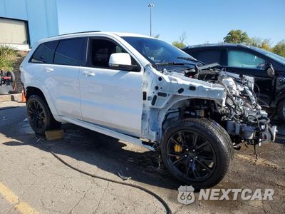 Czwarte zdjęcie samochodu z boku: 2018 JEEP GRAND CHEROKEE TRACKHAWK VIN:1C4RJFN95JC334636 - miniatura