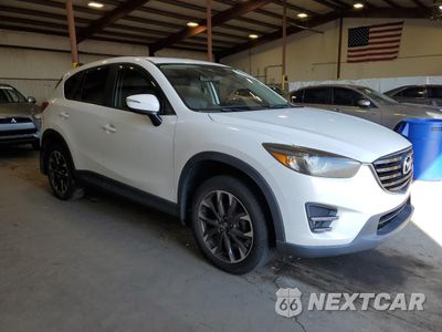 Czwarte zdjęcie samochodu z boku: 2016 MAZDA CX-5 GT VIN:JM3KE2DY3G0768255 - miniatura