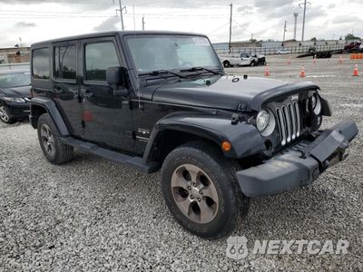 Czwarte zdjęcie samochodu z boku: 2018 JEEP WRANGLER UNLIMITED SAHARA VIN:1C4HJWEG0JL927251 - miniatura