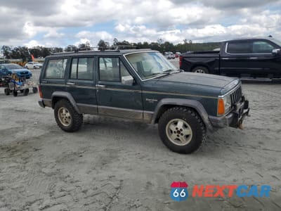 Czwarte zdjęcie samochodu z boku: 1992 JEEP CHEROKEE LAREDO VIN:1J4FJ58S5NL200771 - miniatura