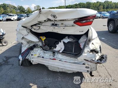 Zdjęcie 6 z 15 samochodu: 2021 TOYOTA CAMRY LE VIN:4T1C11AK4MU555351 - miniatura