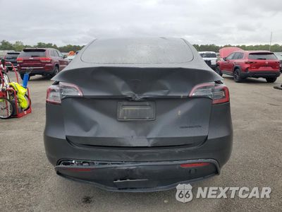 Zdjęcie 6 z 13 samochodu: 2022 TESLA MODEL Y VIN:7SAYGDEE8NF417629 - miniatura