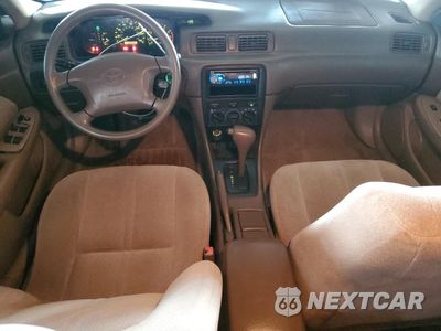 Zdjęcie 8 z 14 samochodu: 2001 TOYOTA CAMRY CE VIN:4T1BG22K61U056416 - miniatura