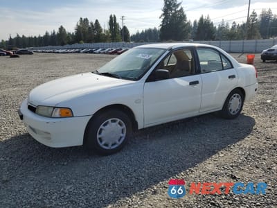 2001 MITSUBISHI MIRAGE ES JA3AY26C41U052816 - główne zdjęcie licytacji z USA - miniatura