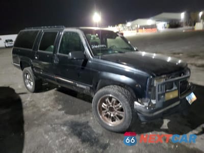 Czwarte zdjęcie samochodu z boku: 1996 CHEVROLET SUBURBAN K2500 VIN:3GNGK26R0TG129910 - miniatura