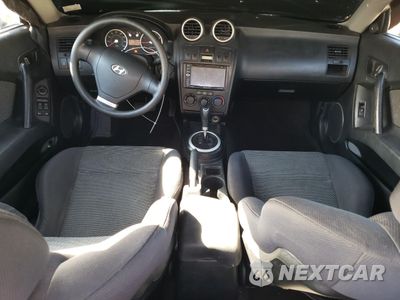 Zdjęcie 8 z 14 samochodu: 2005 HYUNDAI TIBURON VIN:KMHHM65D65U178514 - miniatura