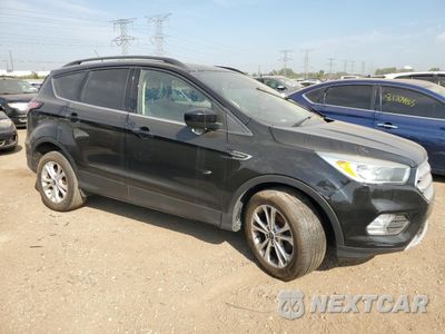 Czwarte zdjęcie samochodu z boku: 2018 FORD ESCAPE SE VIN:1FMCU0GD2JUB00133 - miniatura