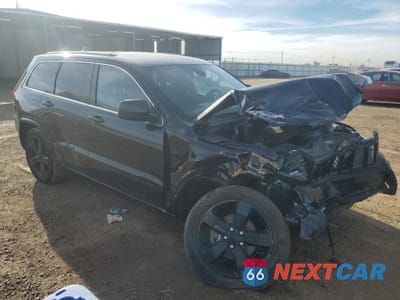 Czwarte zdjęcie samochodu z boku: 2014 JEEP GRAND CHEROKEE LAREDO VIN:1C4RJFAG6EC521622 - miniatura