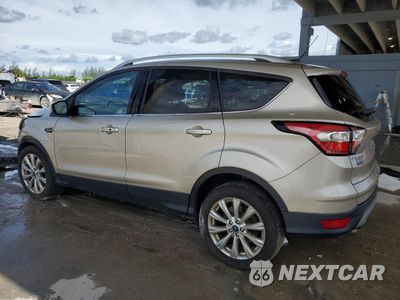 Drugie zdjęcie samochodu z przodu: 2017 FORD ESCAPE TITANIUM VIN:1FMCU9JDXHUC17109 - miniatura