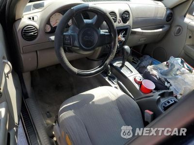 Zdjęcie 8 z 13 samochodu: 2004 JEEP LIBERTY SPORT VIN:1J4GL48K74W271654 - miniatura