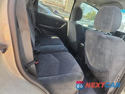 Zdjęcie 11 z 13 samochodu: 2003 MAZDA TRIBUTE LX VIN:4F2YZ94183KM07475 - miniatura