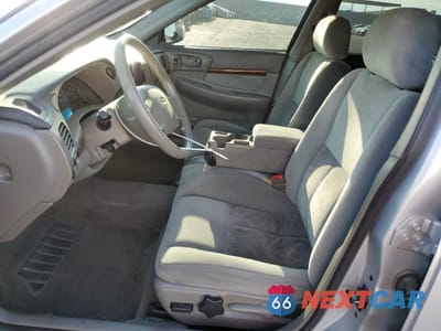 Zdjęcie 7 z 14 samochodu: 2004 CHEVROLET IMPALA VIN:2G1WF52E349102718 - miniatura