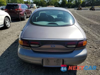 Zdjęcie 6 z 12 samochodu: 1996 FORD TAURUS GL VIN:1FALP52U9TA247169 - miniatura