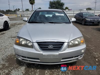Piąte zdjęcie samochodu w środku: 2004 HYUNDAI ELANTRA GLS VIN:KMHDN46D64U819609 - miniatura