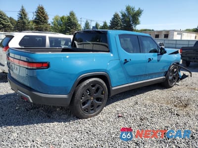 Trzecie zdjęcie samochodu z tyłu: 2025 RIVIAN R1T ADVENTURE VIN:7FCTGBAAXSN039299 - miniatura