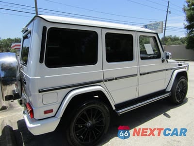 Czwarte zdjęcie samochodu z boku: 2015 MERCEDES-BENZ G 550 VIN:WDCYC3HF2FX229XXX - miniatura