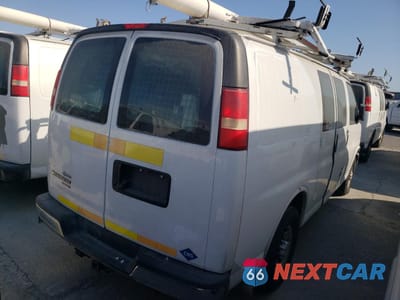 Trzecie zdjęcie samochodu z tyłu: 2014 CHEVROLET EXPRESS G2500 VIN:1GCWGFCB8E1134021 - miniatura