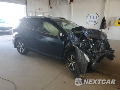 Czwarte zdjęcie samochodu z boku: 2018 TOYOTA RAV4 ADVENTURE VIN:JTMRFREV7JJ250149 - miniatura