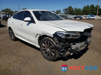 Czwarte zdjęcie samochodu z boku: 2022 BMW X6 XDRIVE40I VIN:5UXCY6C08N9M22202 - miniatura