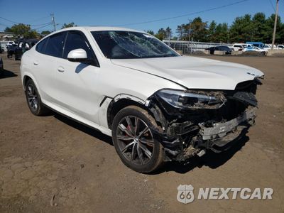 Czwarte zdjęcie samochodu z boku: 2022 BMW X6 XDRIVE40I VIN:5UXCY6C08N9M22202 - miniatura