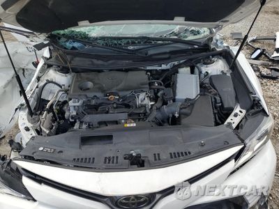 Zdjęcie 11 z 16 samochodu: 2019 TOYOTA CAMRY L VIN:4T1B11HK3KU853405 - miniatura