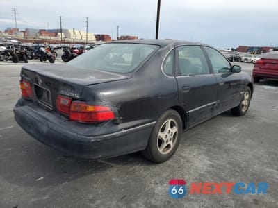 Trzecie zdjęcie samochodu z tyłu: 1999 TOYOTA AVALON VIN:4T1BF18B3XU329096 - miniatura