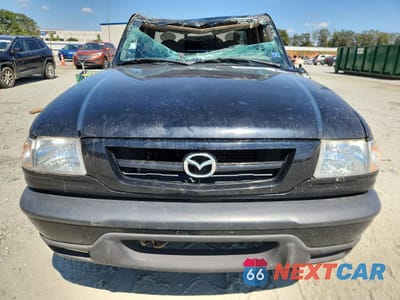 Piąte zdjęcie samochodu w środku: 2002 MAZDA B3000 VIN:4F4YR12U02TM05346 - miniatura