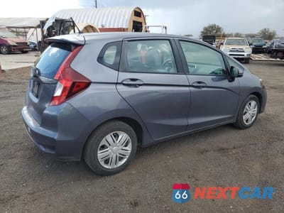 Trzecie zdjęcie samochodu z tyłu: 2020 HONDA FIT LX VIN:3HGGK5H48LM715513 - miniatura