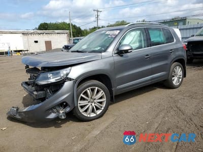 2014 VOLKSWAGEN TIGUAN S WVGBV3AX3EW594879 - główne zdjęcie licytacji z USA - miniatura
