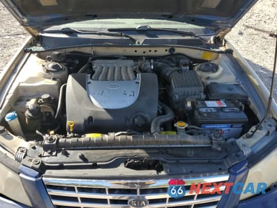 Zdjęcie 11 z 12 samochodu: 2002 KIA OPTIMA MAGENTIS VIN:KNAGD128225158631 - miniatura