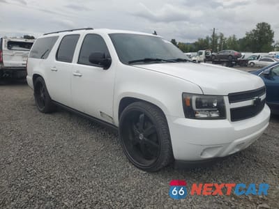Czwarte zdjęcie samochodu z boku: 2007 CHEVROLET SUBURBAN K1500 VIN:3GNFK16367G286476 - miniatura