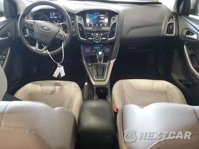 Zdjęcie 8 z 15 samochodu: 2017 FORD FOCUS TITANIUM VIN:1FADP3J2XHL211835 - miniatura
