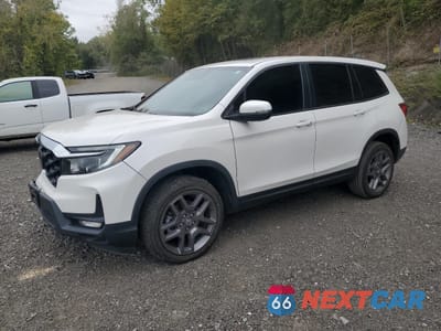 2023 HONDA PASSPORT EXL 5FNYF8H52PB013344 - główne zdjęcie licytacji z USA - miniatura