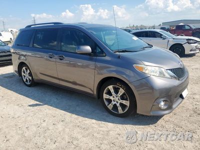 Czwarte zdjęcie samochodu z boku: 2011 TOYOTA SIENNA XLE VIN:5TDYK3DC5BS005732 - miniatura