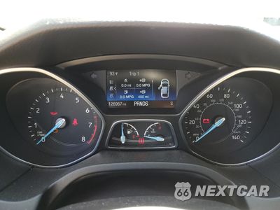 Zdjęcie 9 z 12 samochodu: 2015 FORD FOCUS TITANIUM VIN:1FADP3J29FL274552 - miniatura