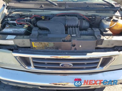 Zdjęcie 12 z 16 samochodu: 2004 FORD E150 CHATE VIN:1FDRE14LX4HA54850 - miniatura
