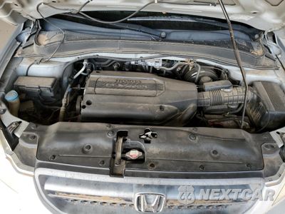 Zdjęcie 11 z 14 samochodu: 2004 HONDA PILOT EX VIN:2HKYF18434H580707 - miniatura