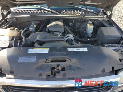 Zdjęcie 11 z 14 samochodu: 1999 GMC NEW SIERRA K1500 VIN:1GTEK19T8XZ535635 - miniatura