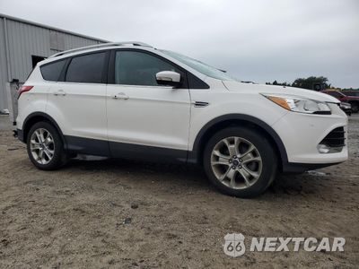 Czwarte zdjęcie samochodu z boku: 2014 FORD ESCAPE TITANIUM VIN:1FMCU0JX8EUD92024 - miniatura